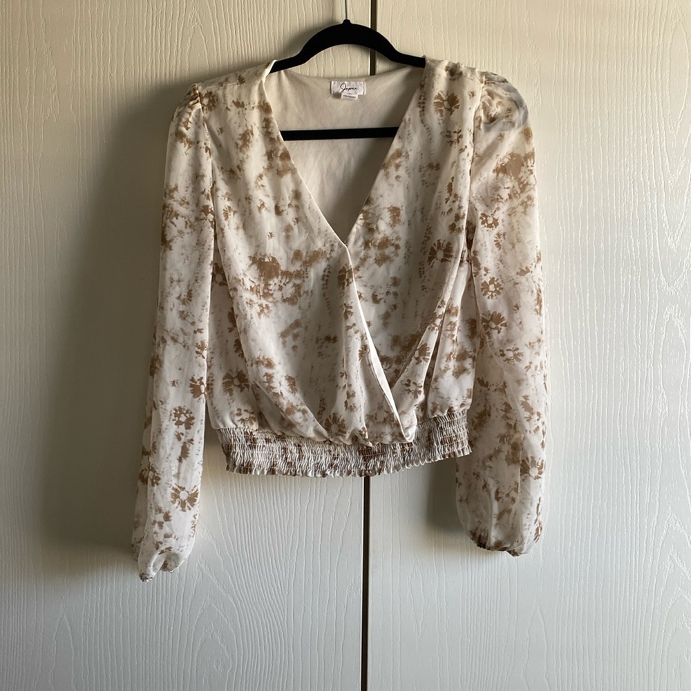 Medium long sleeve blouse. Worn once. Very comfy and breathable.